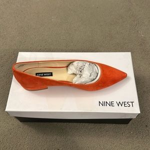 Women’s orange suede low pumps